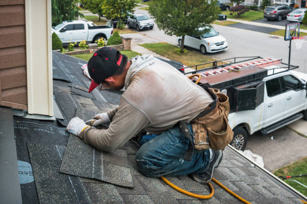 Professional Storm Damage Roof Repair technician working in Martinsville, VA